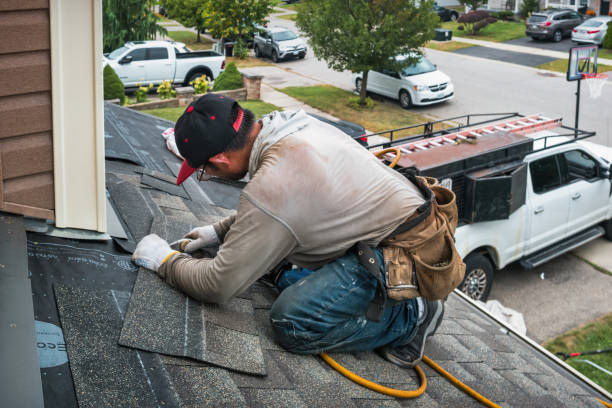 Professional Gutter Repair And Installation technician working in Hudson, IA